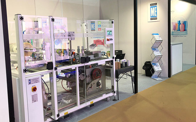 TM series overwrapping machine on the stand at Beautyworld ME 2022