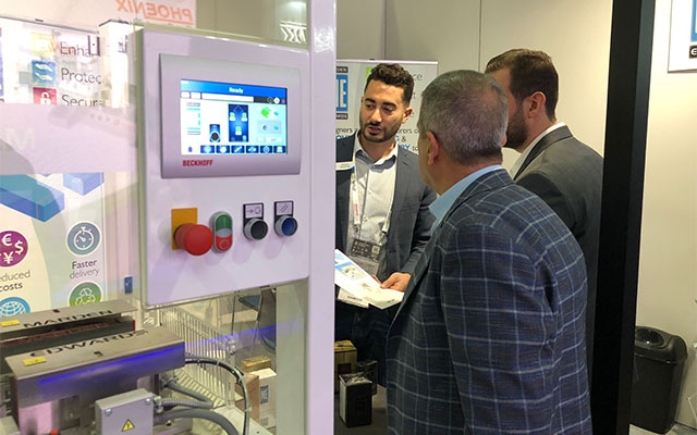 Victor demonstrating the TM Series overwrapper at Beautyworld Middle East 2022