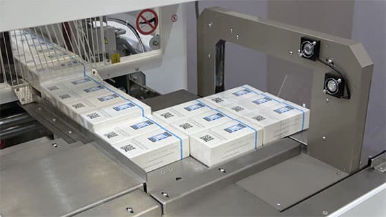 B Series ovewrapper with banding system