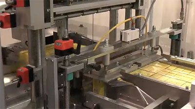 Collating and Overwrapping Multipack Tea Cartons at 12 per minute