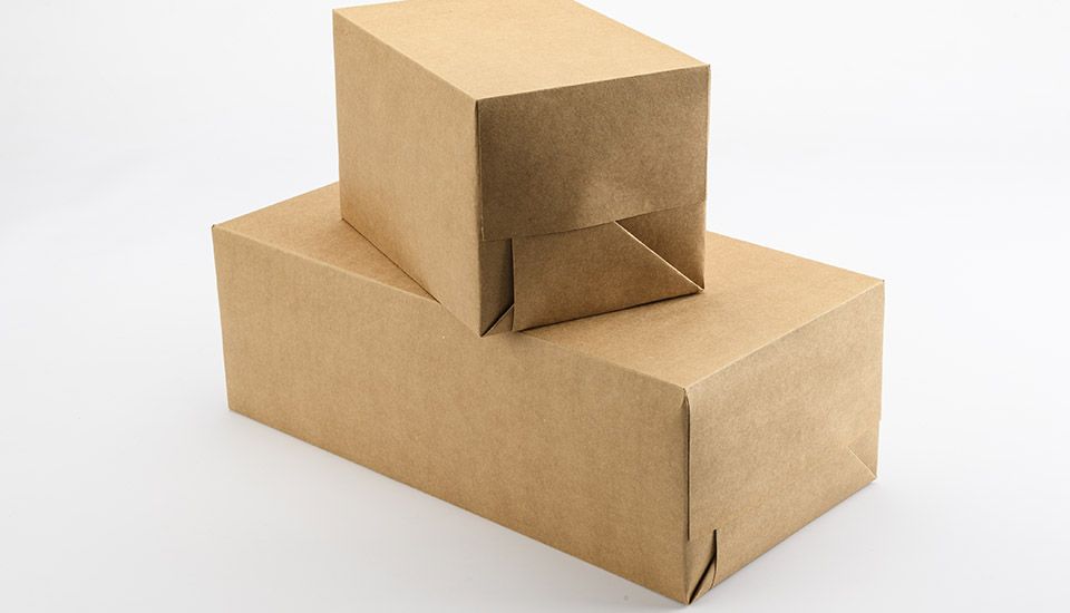 Agrupación de Cajas de Cartón Envueltas en Papel Kraft Biodegradable